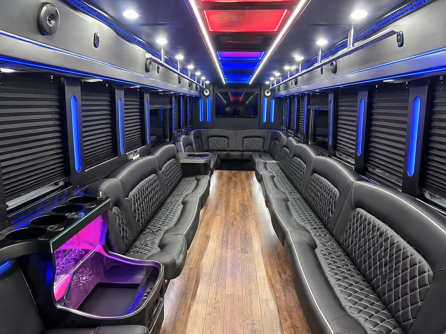 Passenger seating aboard a party bus rental serving Warren